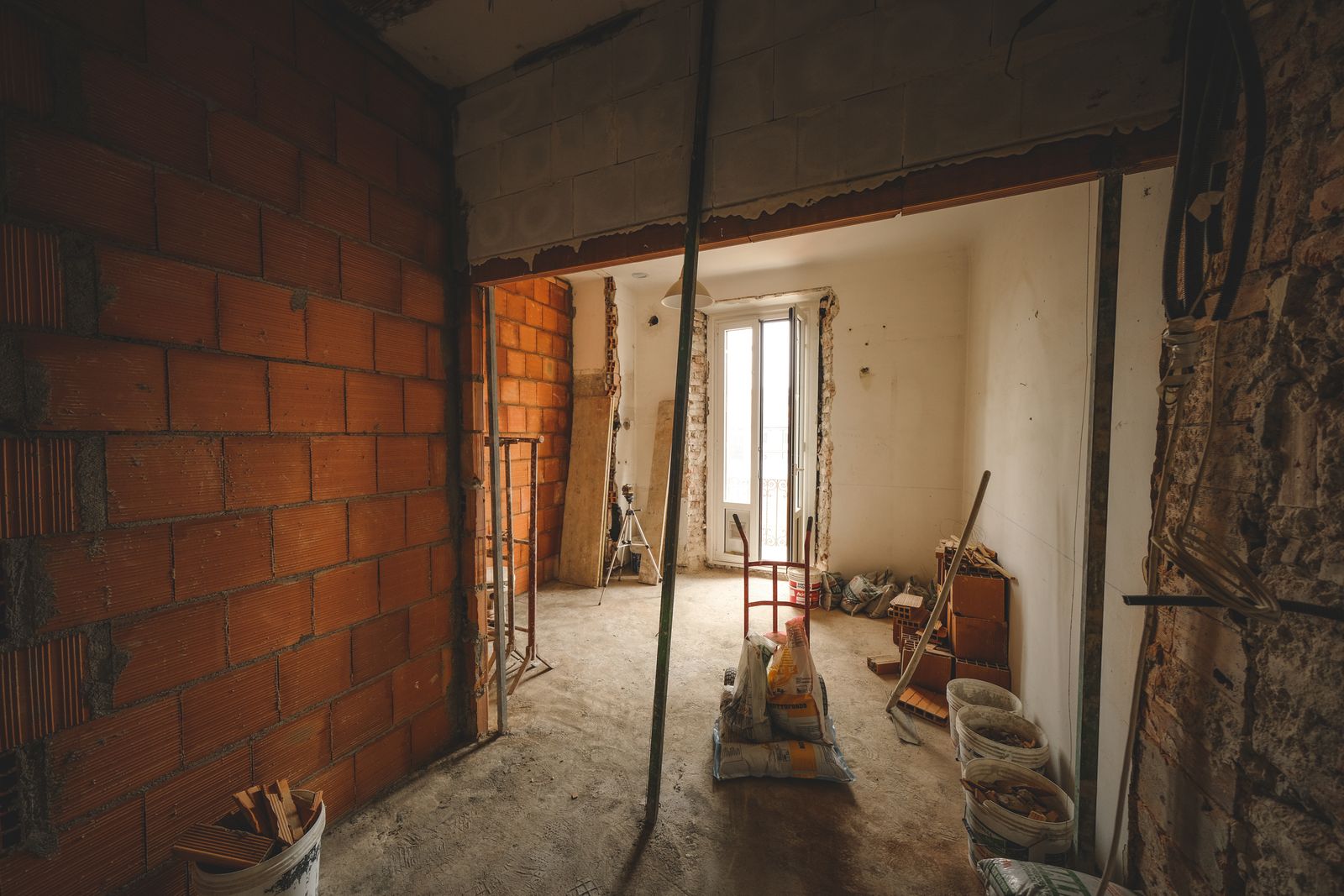 The Montford bathroom mid-demolition with the shower pan removed